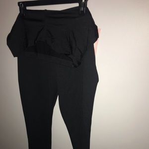 Black full panel maternity pants in a size L